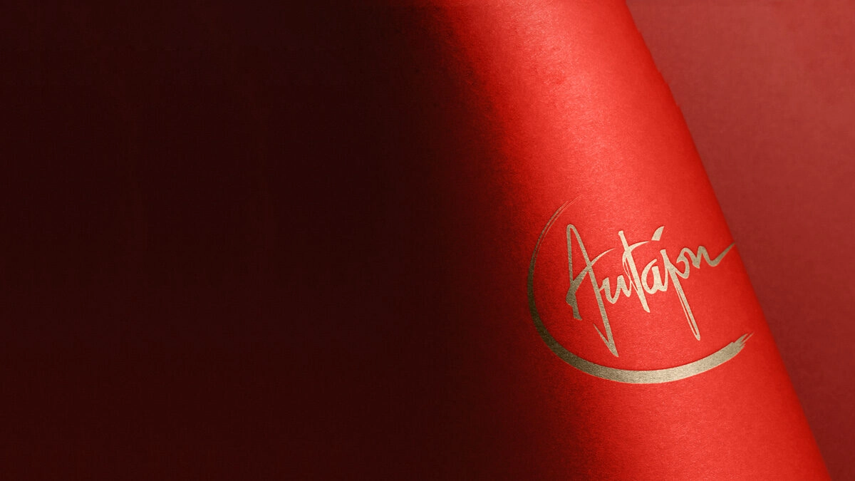 Papier rouge avec dorure logo Autajon