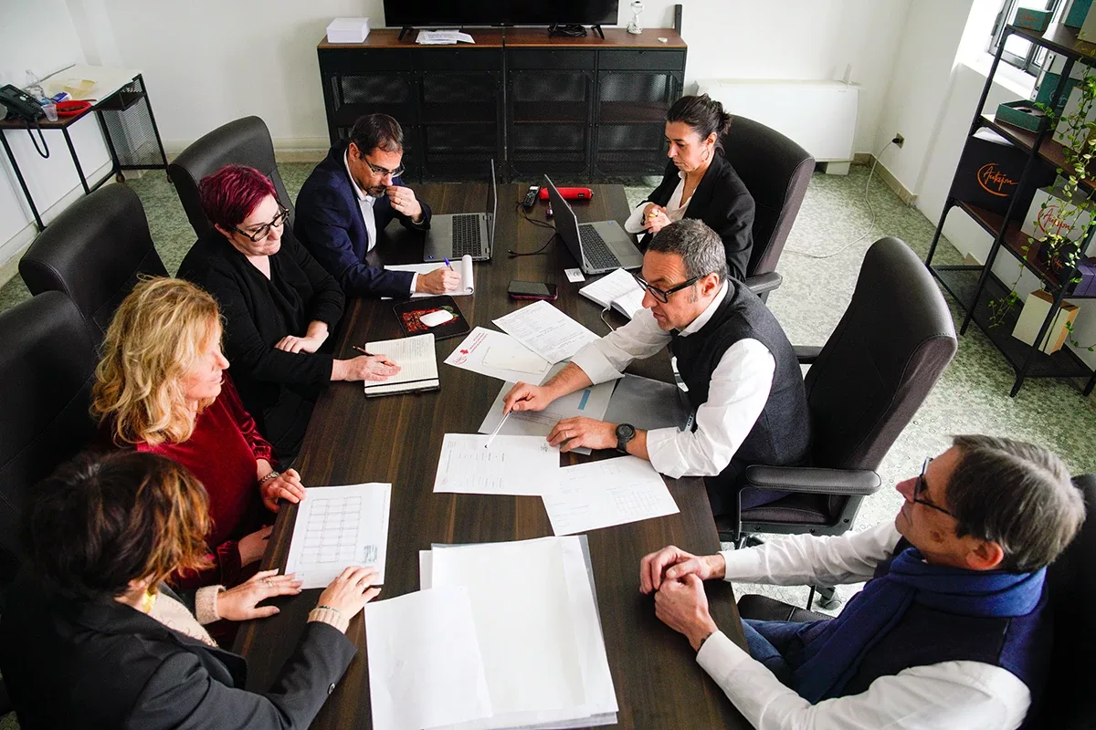 Autajon team members gathered for a business discussion